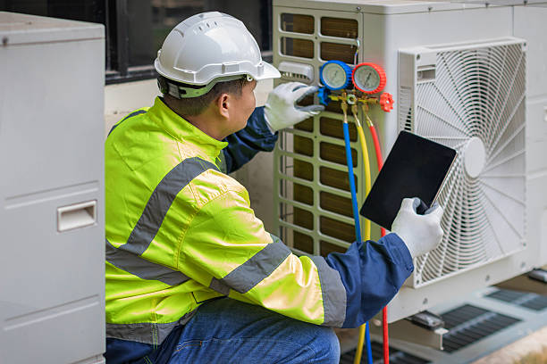 Professional Hvac Maintenance technician working in Village Mills, TX